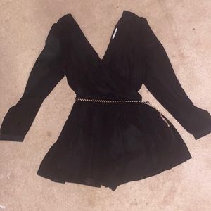 Black romper with chain belt